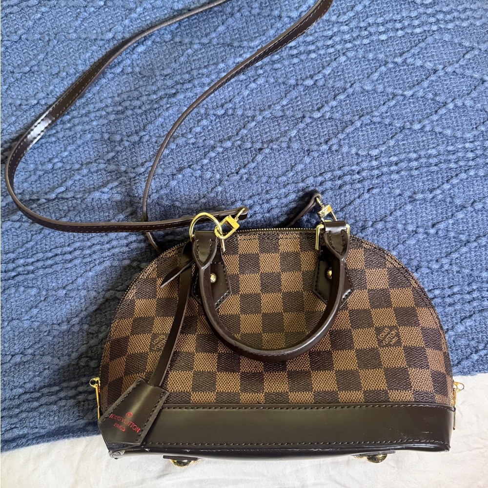 Brown checker crossbody bag